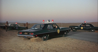 arandomaniac.us_wp_content_uploads_2011_02_vanishing_point_cops.png